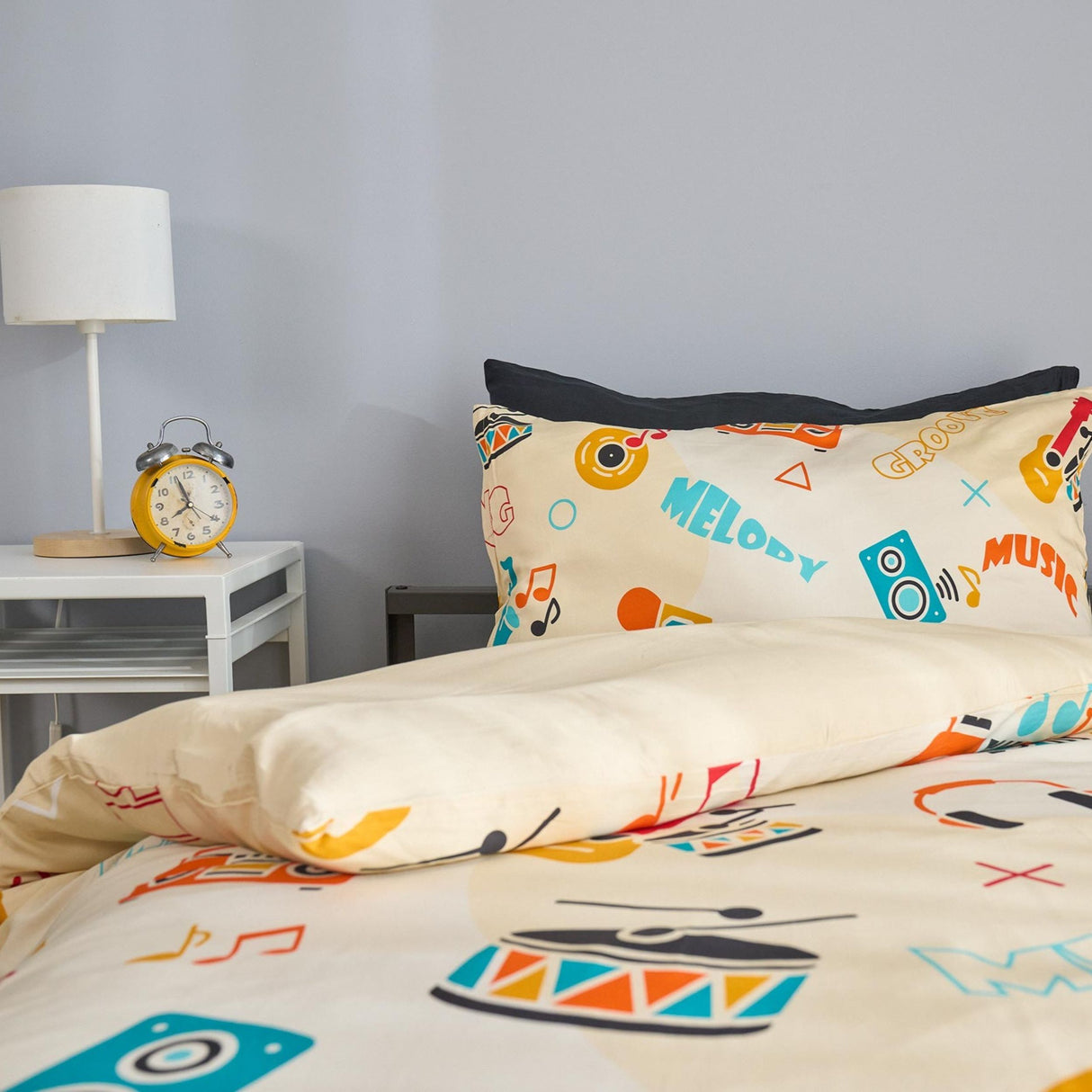 Bedding set with musical theme design in a bedroom setting