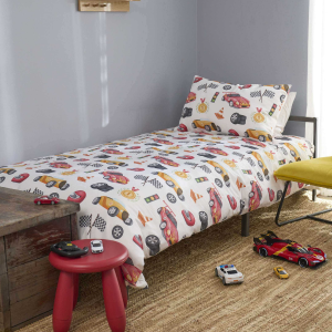 Quilt cover with racing car designs on a bed with cars on the carpet
